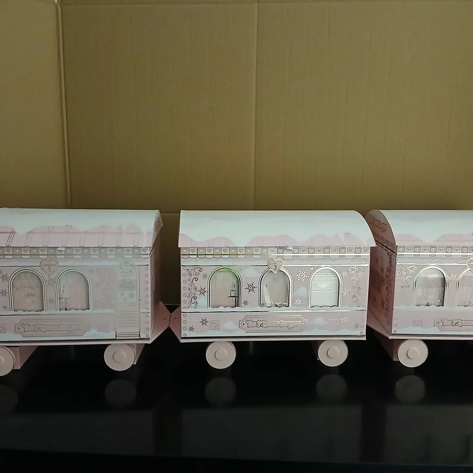 P.LOUISE EXPRESS ADVENT CALENDAR TRAIN – PINK COSMETIC CALENDAR (FRAGILE)