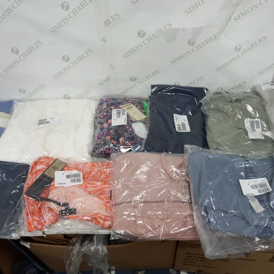 LARGE BOX OF ASSORTED CLOTHING ITEMS TOO INCLUDE TOPS , TROUSERS AND JUMPERS COMING IN DIFFERENT COLOURS AND SIZES 