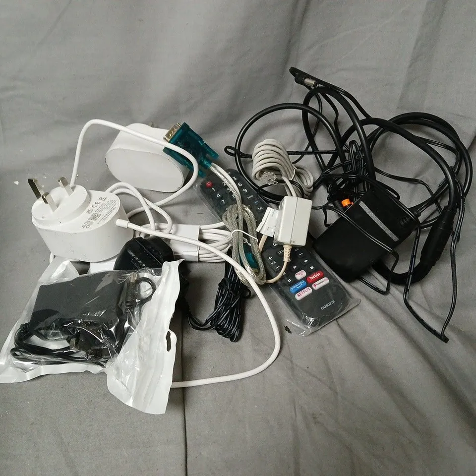 APPROXIMATELY 10 ASSORTED HOUSEHOLD ITEMS TO INCLUDE CABLES, REMOTES, CHARGERS, ETC
