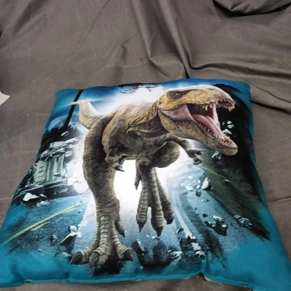 JURASSIC WORLD DINOSAUR PRINT DECORATIVE CUSHION – TEAL BACKGROUND