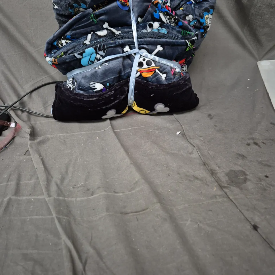 WHERE COMFORT BEGINS – NAVY BLUE SKULL & CROSSBONES MOTIF, TIED WITH PALE BLUE RIBBON