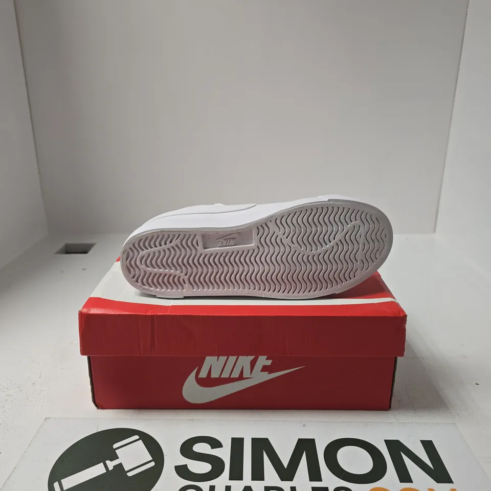 BOXED PAIR OF NIKE TENNIS ESSENTIAL SHOES SIZE 5.5