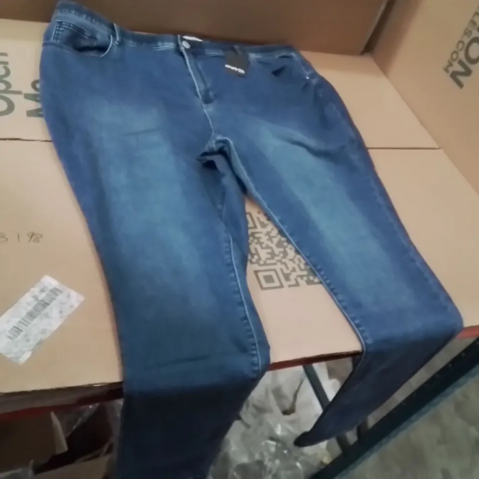 BOXED BRAND NEW APPROXIMATELY 9 COSY SKINNY JEANS MID WASH SIZE 24L
