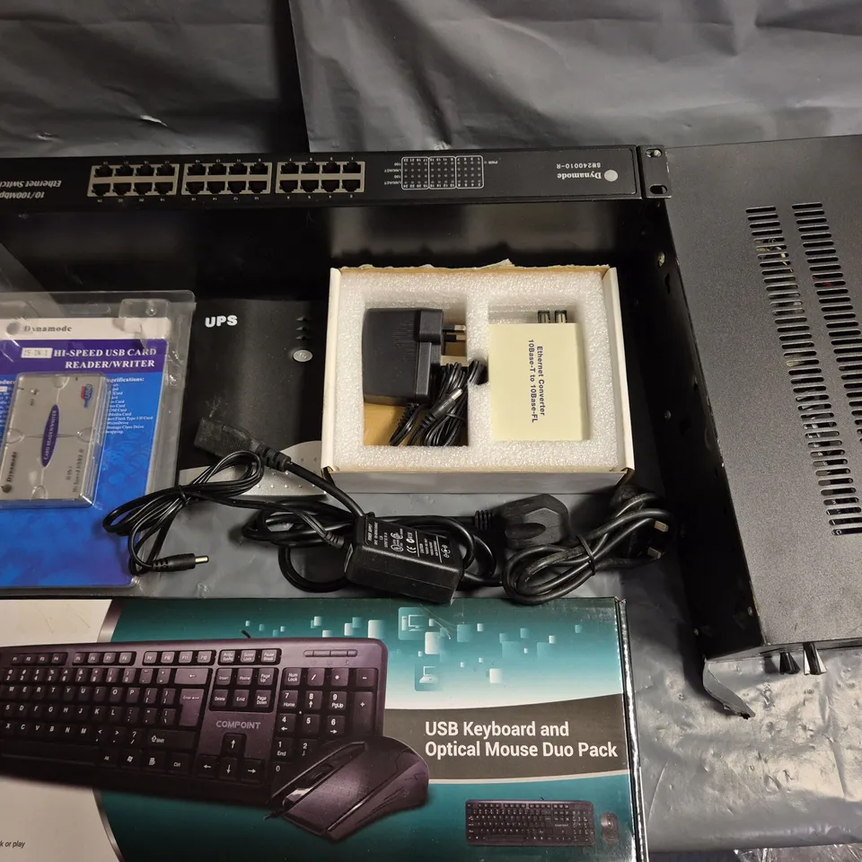 PALLET OF ASSORTED TECH ITEMS TO INCLUDE USB KEYBOARDS, CARD READERS, DYNAMODE ETHERNET SWITCHES AND ETHERNET CONVERTERS
