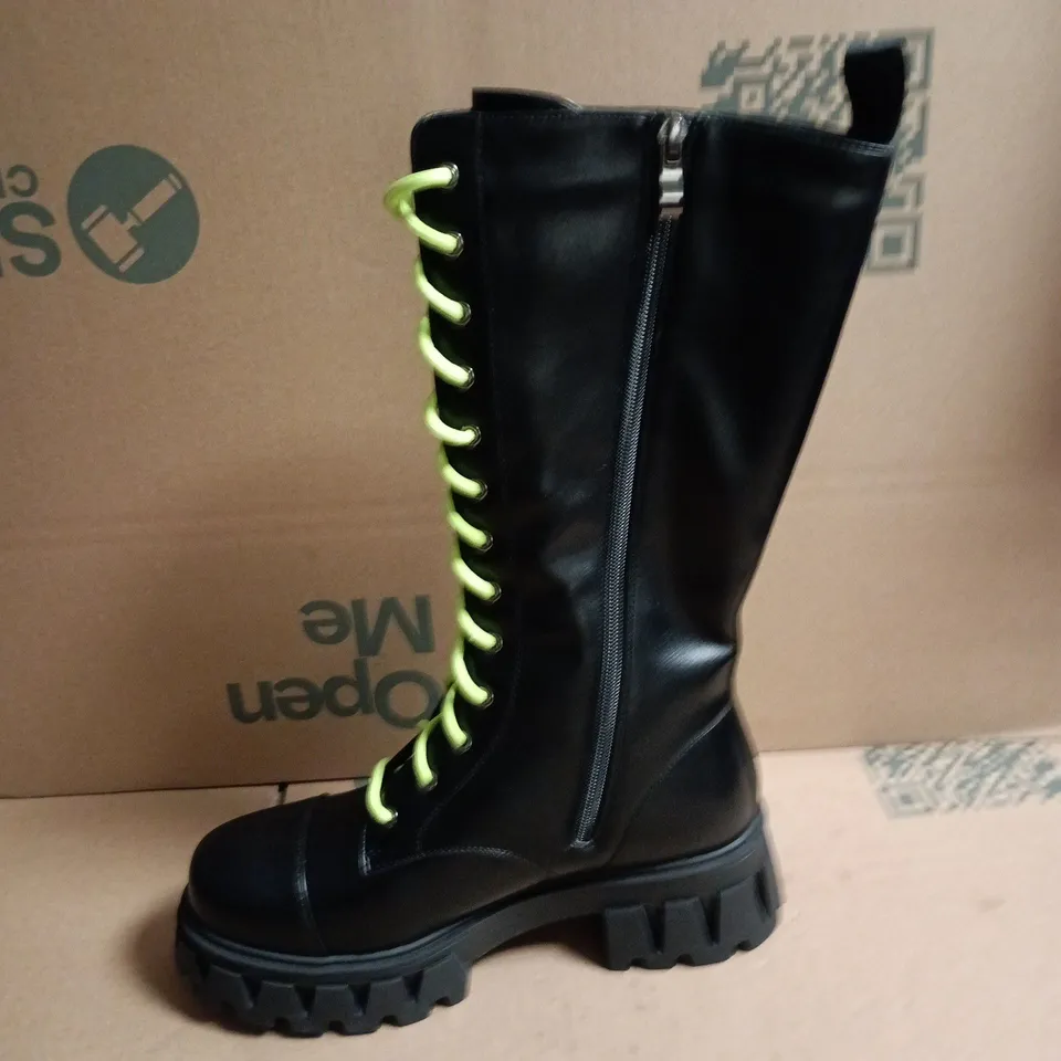 BOXED KOI BLACK KNEE-HIGH COMBAT BOOT WITH NEON LIME LACES AND MOON-&-STAR EMBROIDERY - UK 6