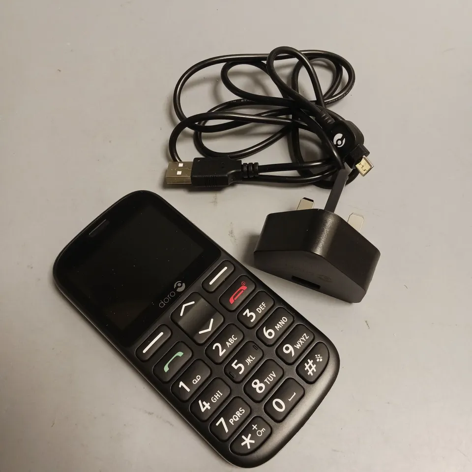 DORO DUAL SIM CAMRA PHONE BLUETOOTH ENABLED INCLUDES CHARGING CABLE AND PLUG