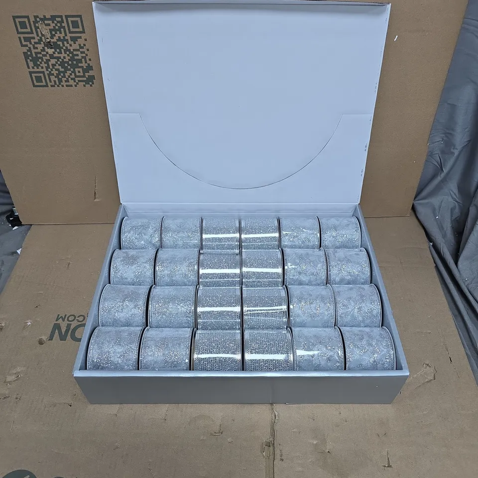 LARGE QUANTITY OF GISELA GRAHAM LONDON DECORATIVE RIBBON ROLLS – 6 BOX SETS OF 24 (144 in total) 63MM X 3M, SILVER