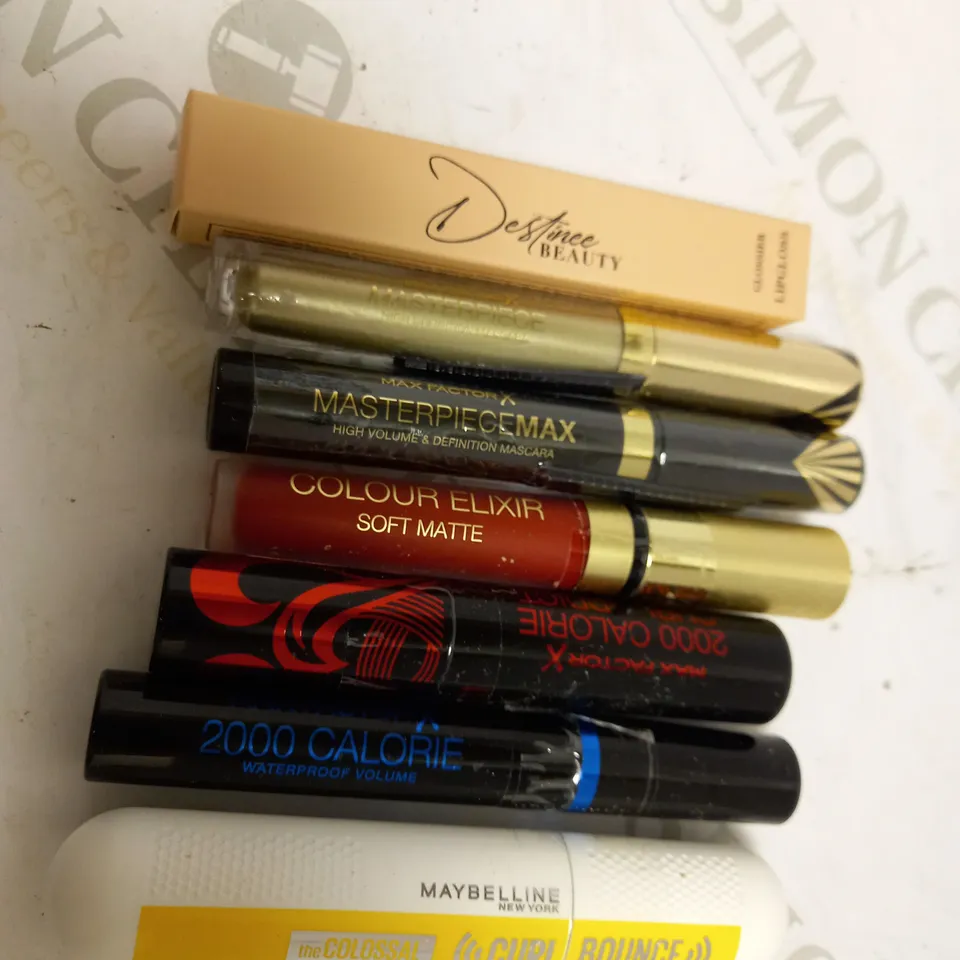 LOT OF APPROX 7 TO INCLUDE MASCARA , LASH CURLERS , LIPGLOSS , ETC