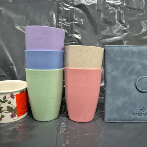 APPROXIMATELY 10 ASSORTED HOUSEHOLD ITEMS TO INCLUDE PASSPORT CASE, ASSORTMENT OF MULTICOLOURED CUPS, ETC - COLLECTION ONLY