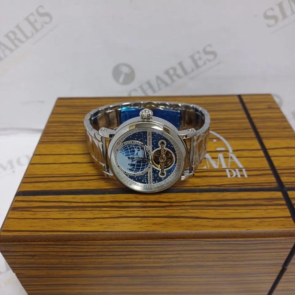 MEN’S HELMA DH AUTOMATIC WORLD VIEW WATCH – TOURBILLON MOVEMENT – BLUE DIAL – STAINLESS STEEL STRAP – GLASS EXHIBITION BACK CASE