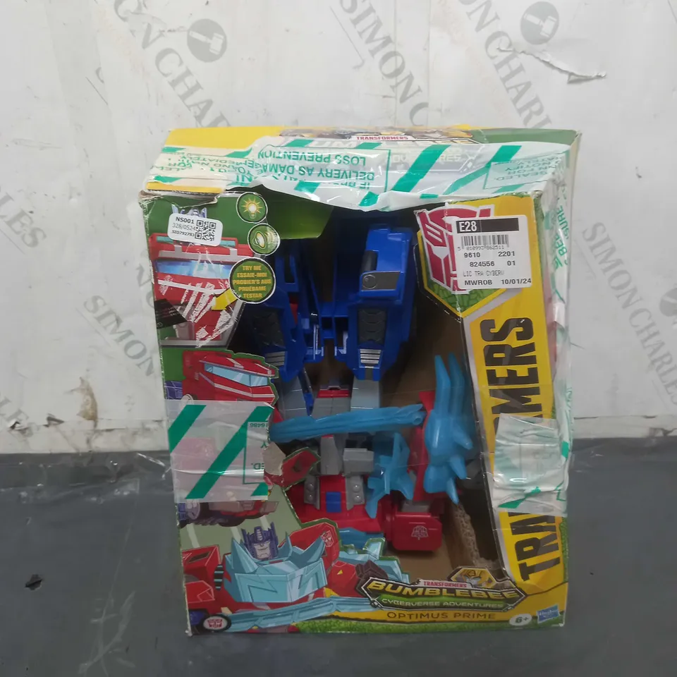 TRANSFORMERS OPTIMUS PRIME ROLL N CHANGE 