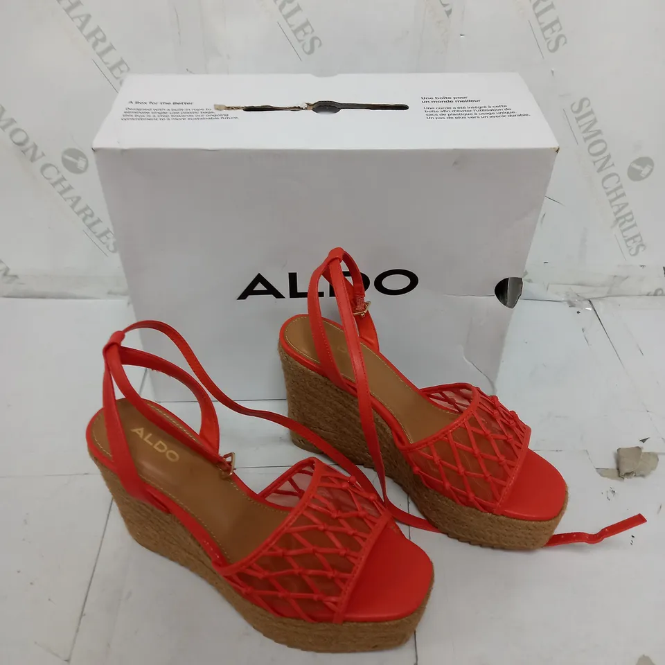 BOXED PAIR OF ALDO DELLEN WEDGE HEELS IN ORANGE SIZE 4.5