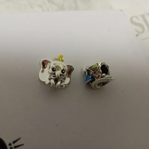 PAIR OF PANDORA DISNEY CHARMS (DUMBO + ALICE IN WONDERLAND)