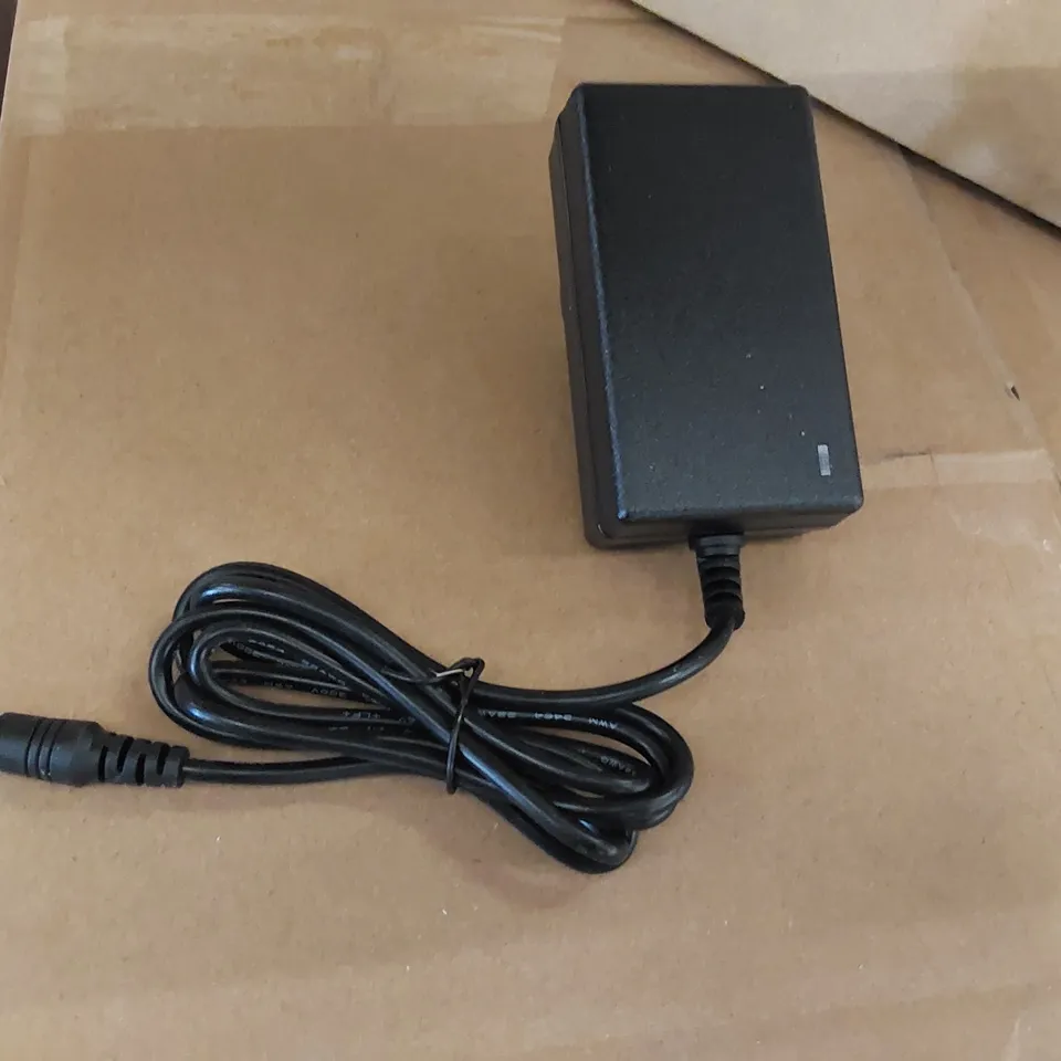 LOT OF APPROXIMATELY 50X BRAND NEW FLH-D1210 AC ADAPTERS (1 BOX)