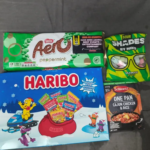 APPROXIMATELY 10 ASSORTED FOOD AND DRINK ITEMS TO INCLUDE HARIBO, AERO, ETC