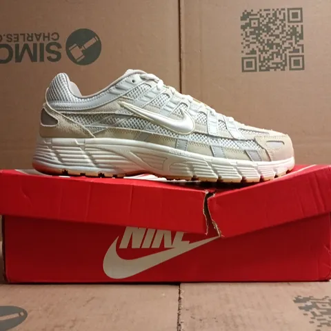 BOXED PAIR OF NIKE P-6000 TRAINERS IN LIGHT BEIGE/GREY SIZE UK 8.5