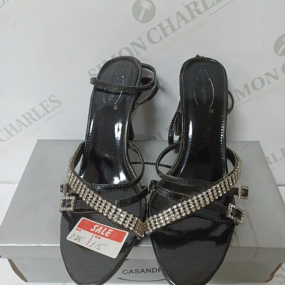 BOXED PAIR OF CASANDRA HEELED SANDALS IN BLACK SIZE 5 