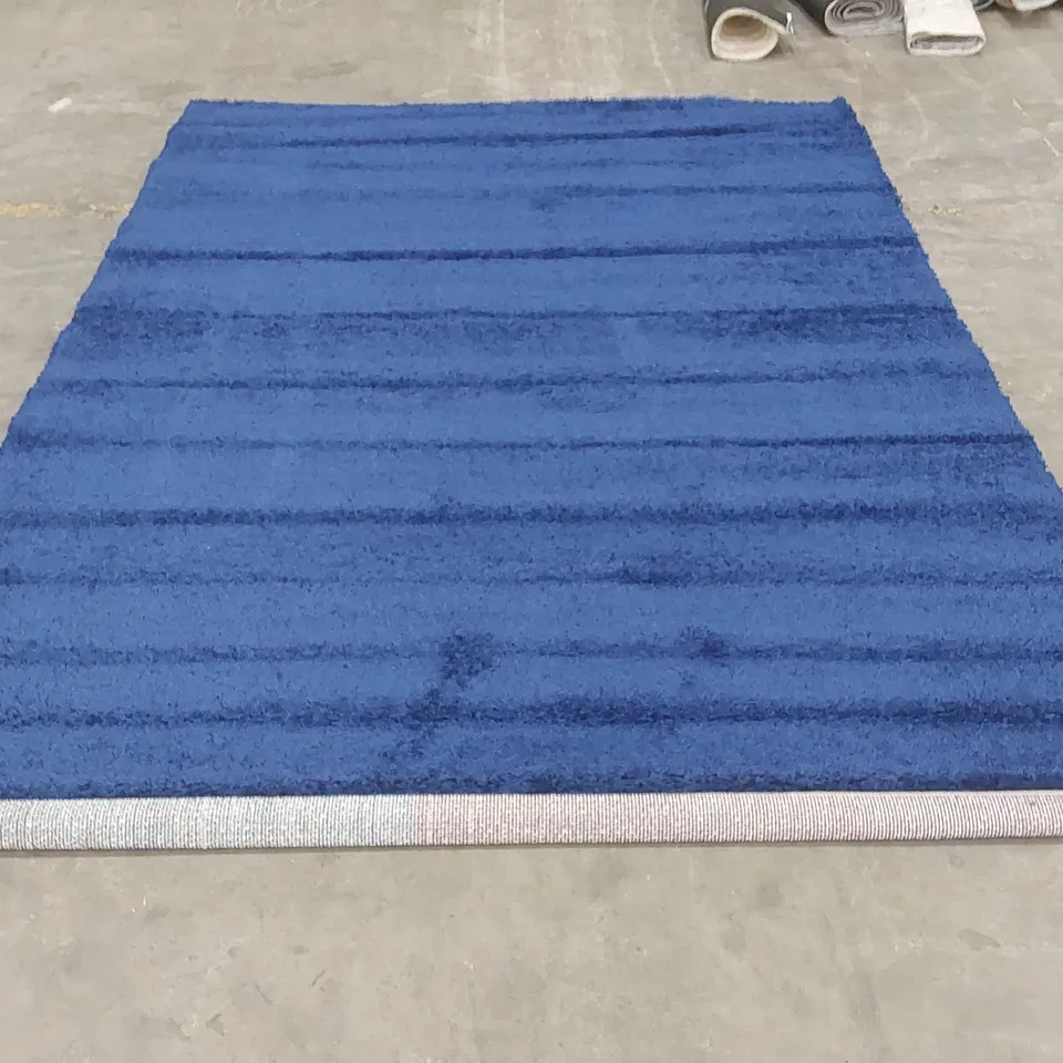 ANNIE-LOUISA SOLID COLOUR MACHINE WOVEN SHAGGY RUG - NAVY // SIZE: 240 X 330cm