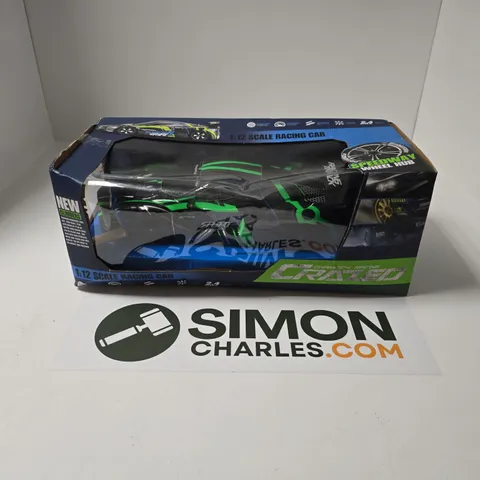 BOXED CHAMPION RACING CRAZED 1:12 SCALE RACING CAR