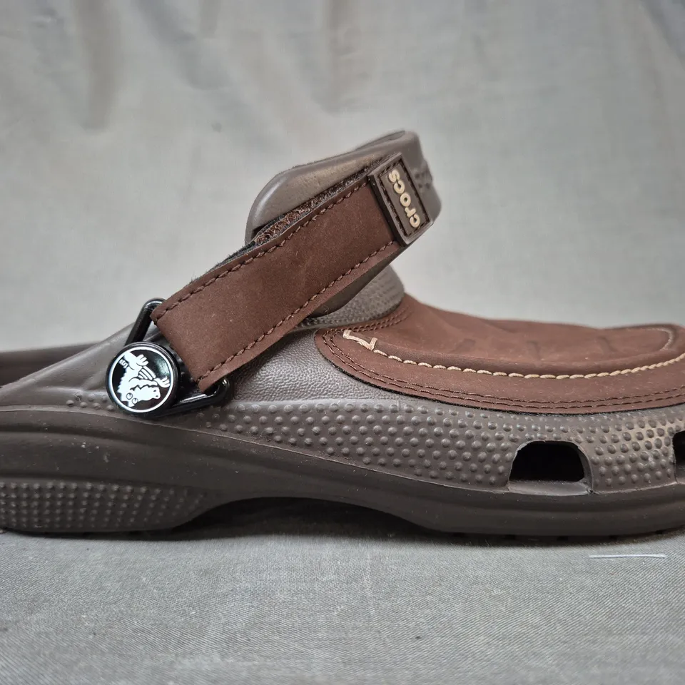 PAIR OF CROCS YUKON VISTA II CLOGS IN DARK BROWN UK SIZE 7