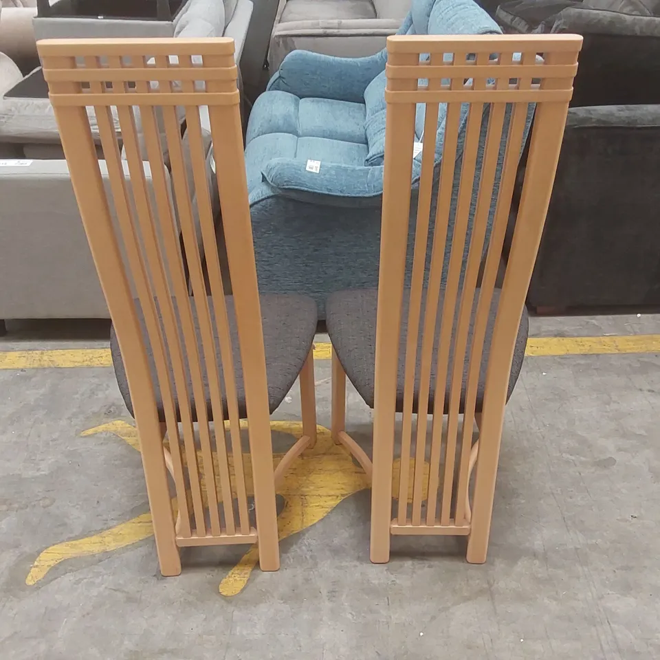 PAIR OF DESIGNER WOODEN HIGH BACK DINING CHAIRS WITH UPHOLSTERED PADDED SEATS