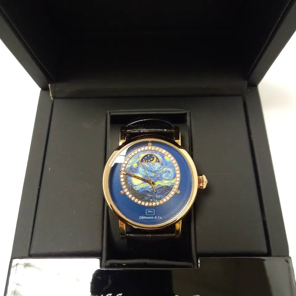 ZIHLMANN & CO BLUE PICASSO MOON FACE LEATHER STRAP WRISTWATCH