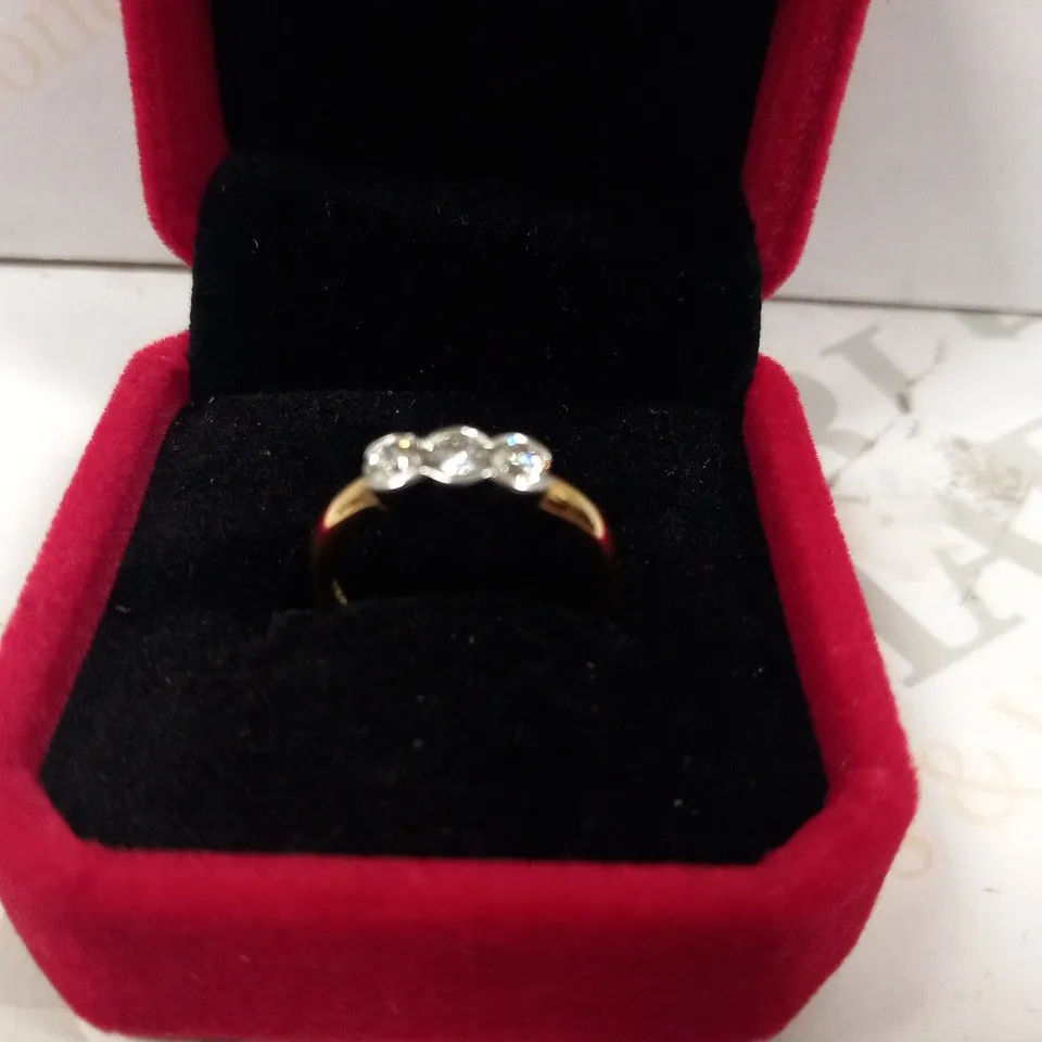 18CT GOLD THREE STONE RING RUB OVER SET WITH DIAMONDS