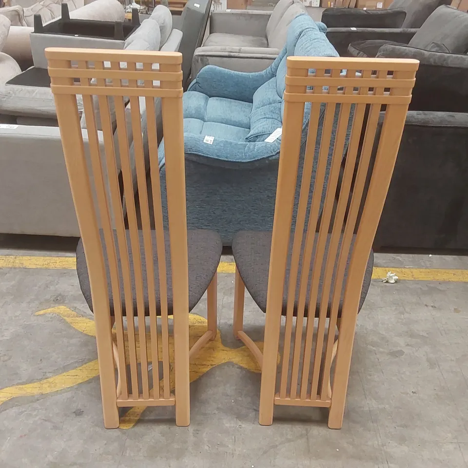 PAIR OF DESIGNER WOODEN HIGH BACK DINING CHAIRS WITH UPHOLSTERED PADDED SEATS