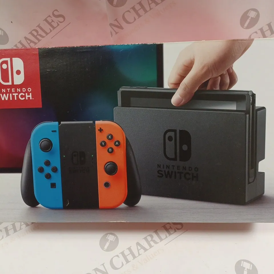 BOXED NINTENDO SWITCH WITH CONTROLLERS AND ACCESSORIES