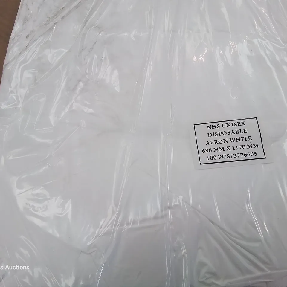 PALLET OF 65 CASES EACH CONTAINING 1000 UNISEX DISPOSABLE WHITE APRONS 686 × 1170mm 