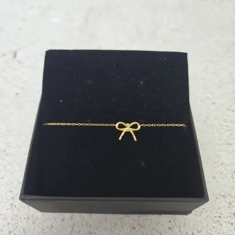 GOLD-TONE BOW BRACELET