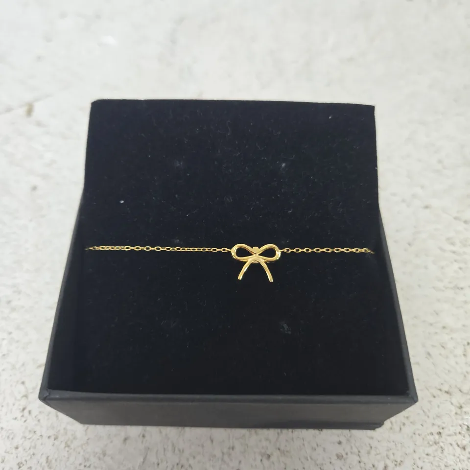 GOLD-TONE BOW BRACELET