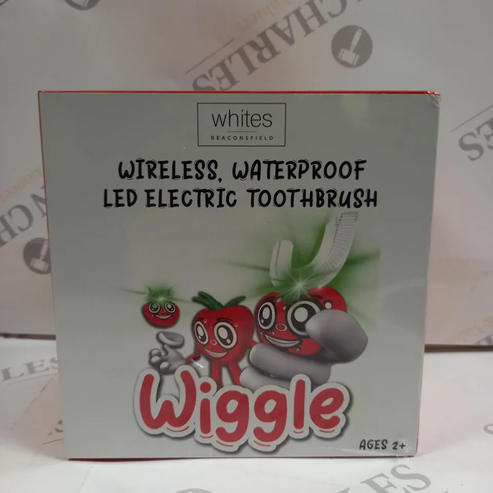 BOXED & SEALED “WIGGLE” CHILDREN'S ELECTRIC TOOTHBRUSH