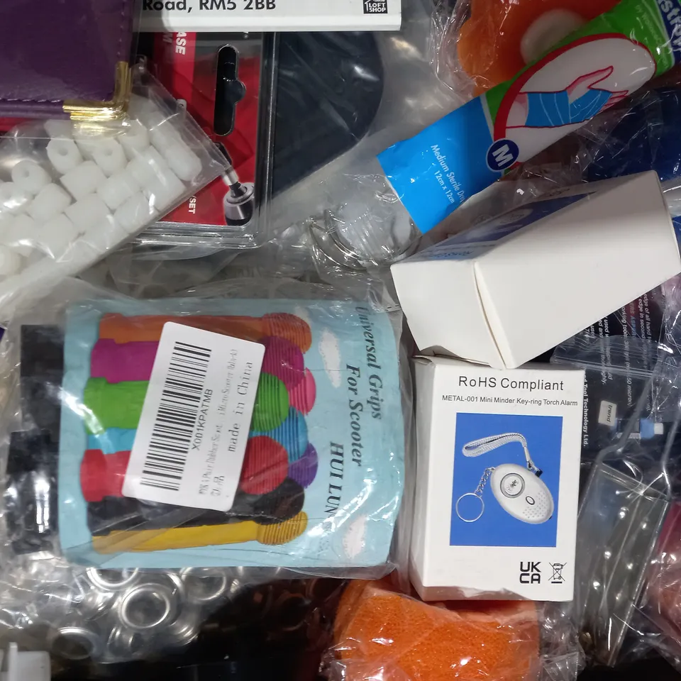 LOT OF APPROXIMATELY 10 ASSORTED HOUSEHOLD ITEMS TO INCLUDE TAPE MEASURE, CORRECTION FLUID, 3-WAY ADAPTER, ETC