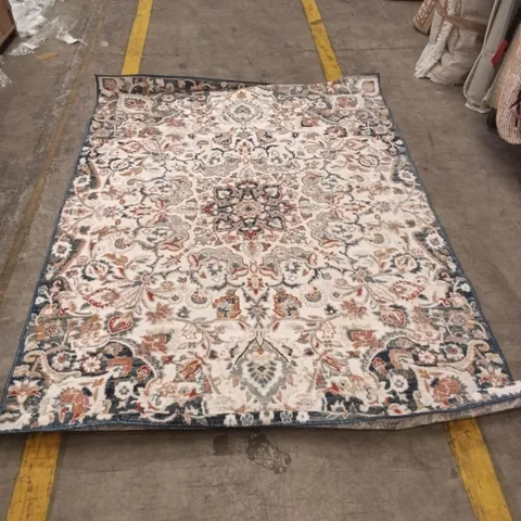 PATTERNED ORIENTAL-STYLE AREA RUG – CREAM WITH BLUE BORDER APPROXIMATELY 220 CM X 156 CM