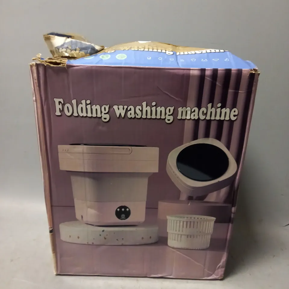 BOXED UNBRANDED FOLDING WASHING MACHINE 