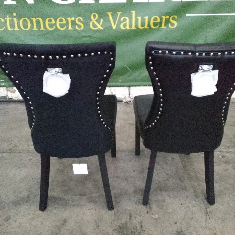 2 MIXED NEW BUTTON BACK DINING CHAIRS (1 BLACK LEATHER, 1 BLACK VELVET)