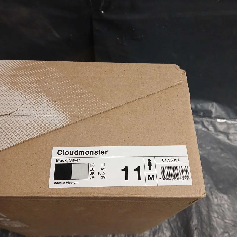 BOXED PAIR OF ON RUNNING CLOUDMONSTER TRAINERS – BLACK/SILVER, UK 10.5 (US 11)