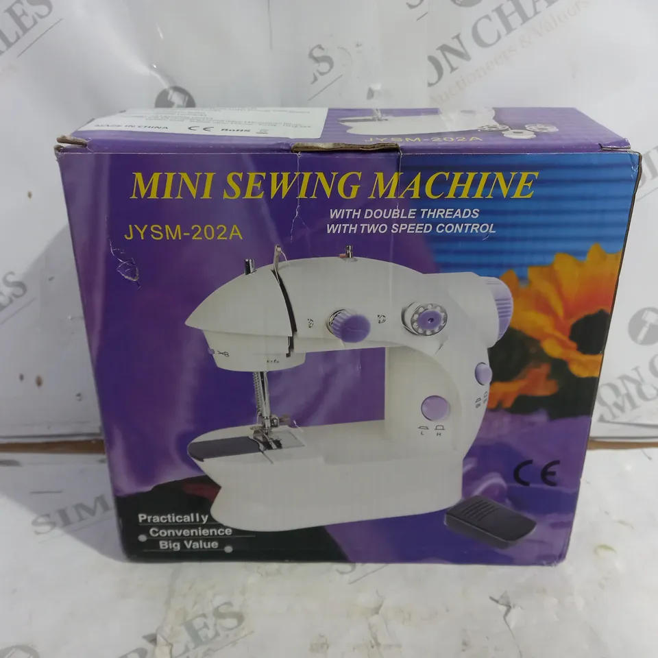 BOXED UNBRANDED MINI SEWING MACHINE JYSM-202A
