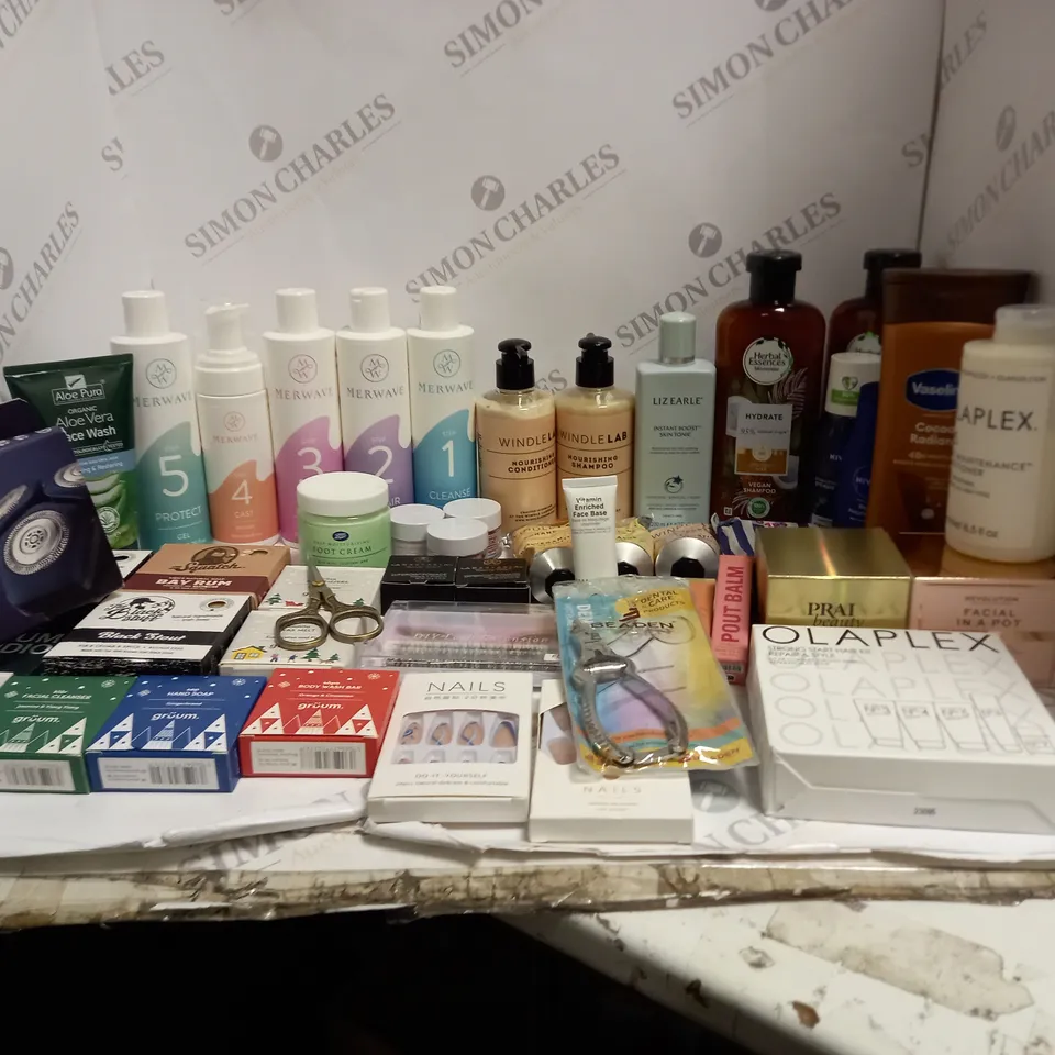 BOX OF ASSORTED COSMETICS TO INCLUDE OLAPLEX, REVOLUTION, PRAI BEAUTY ETC