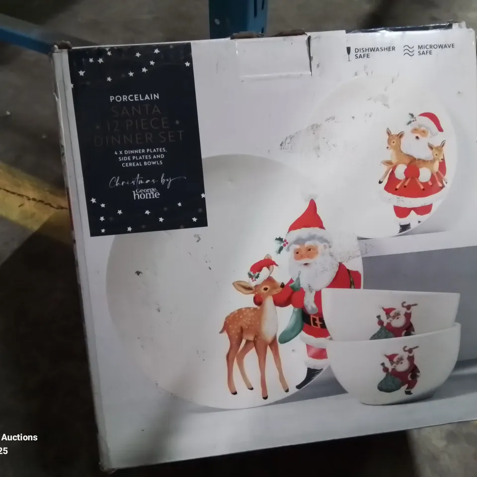 BOXED PORCELAIN SANTA 12 PIECE DINNER SET