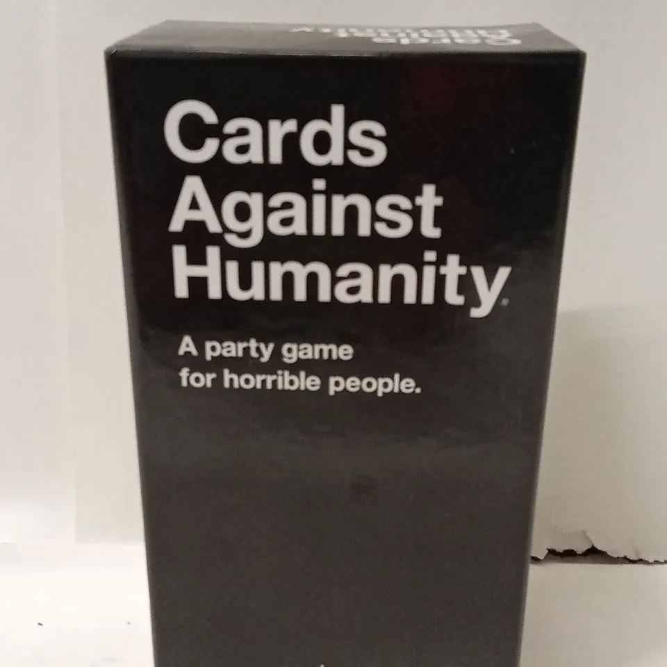 BOXED CARDS AGAINST HUMANITY – UK EDITION (PARTY GAME)
