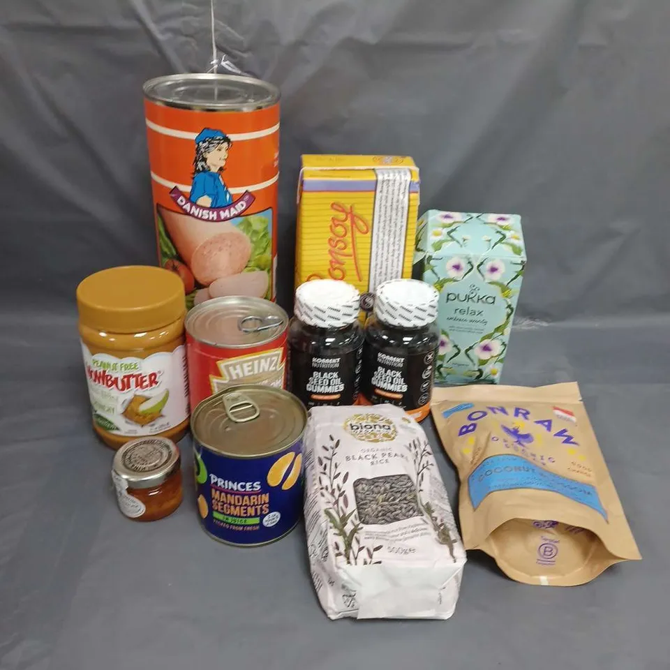 LOT OF APPROXIMATELY 11 ASSORTED FOOD AND DRINK ITEMS TO INCLUDE CANNED MEAT, PEANUT BUTTER AND PUKKA TEABAGS