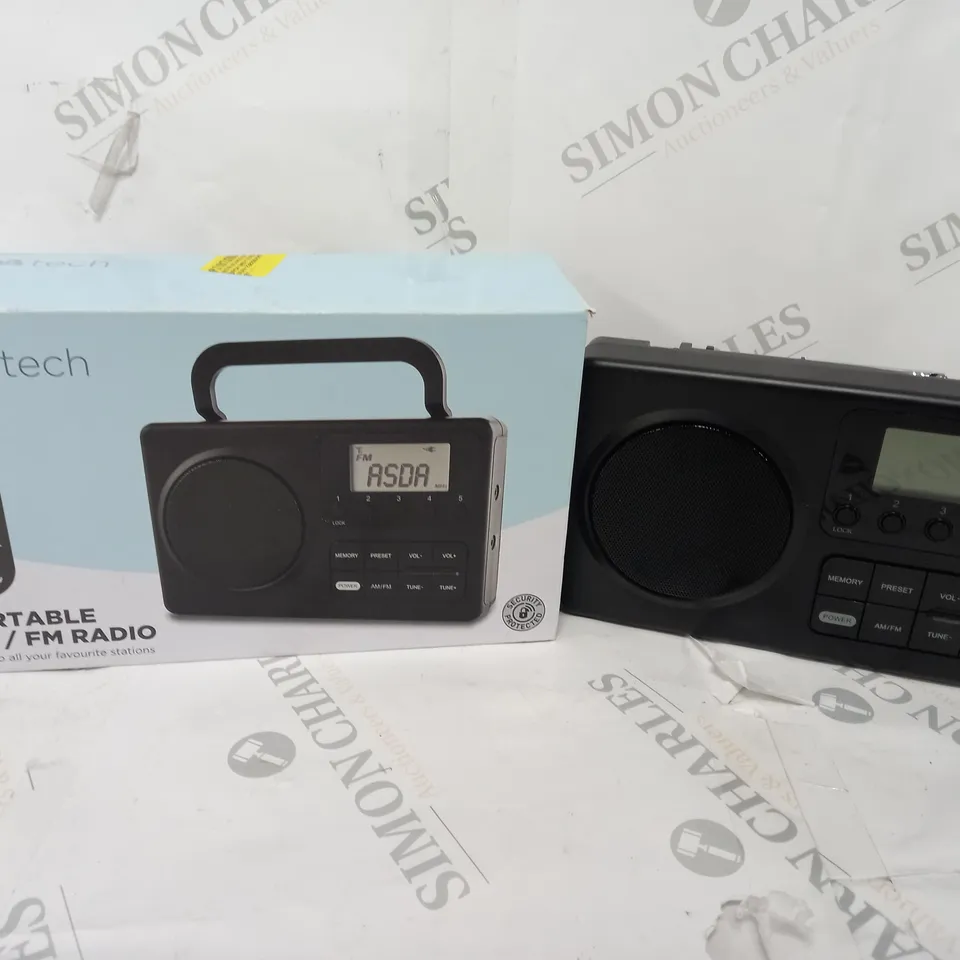 BOXED PORTABLE AM/FM RADIO IN BLACK