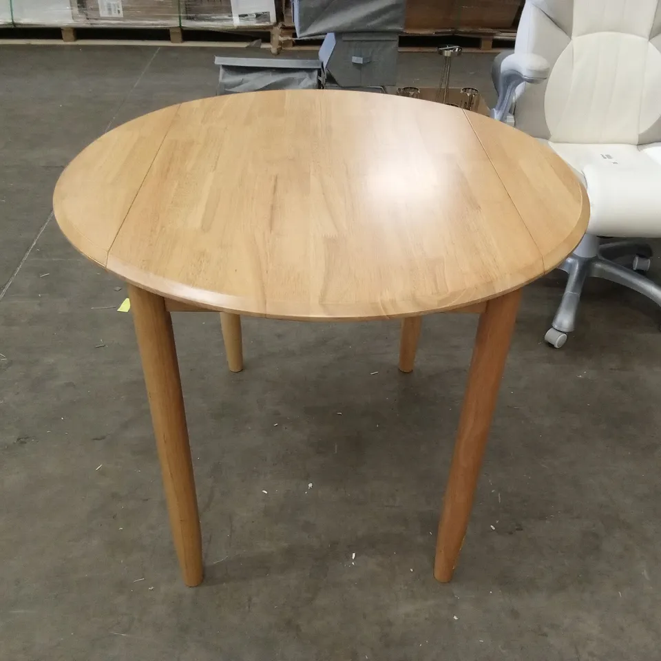 ANKRUM EXTENDABLE DROP LEAF SOLID OAK DINING TABLE