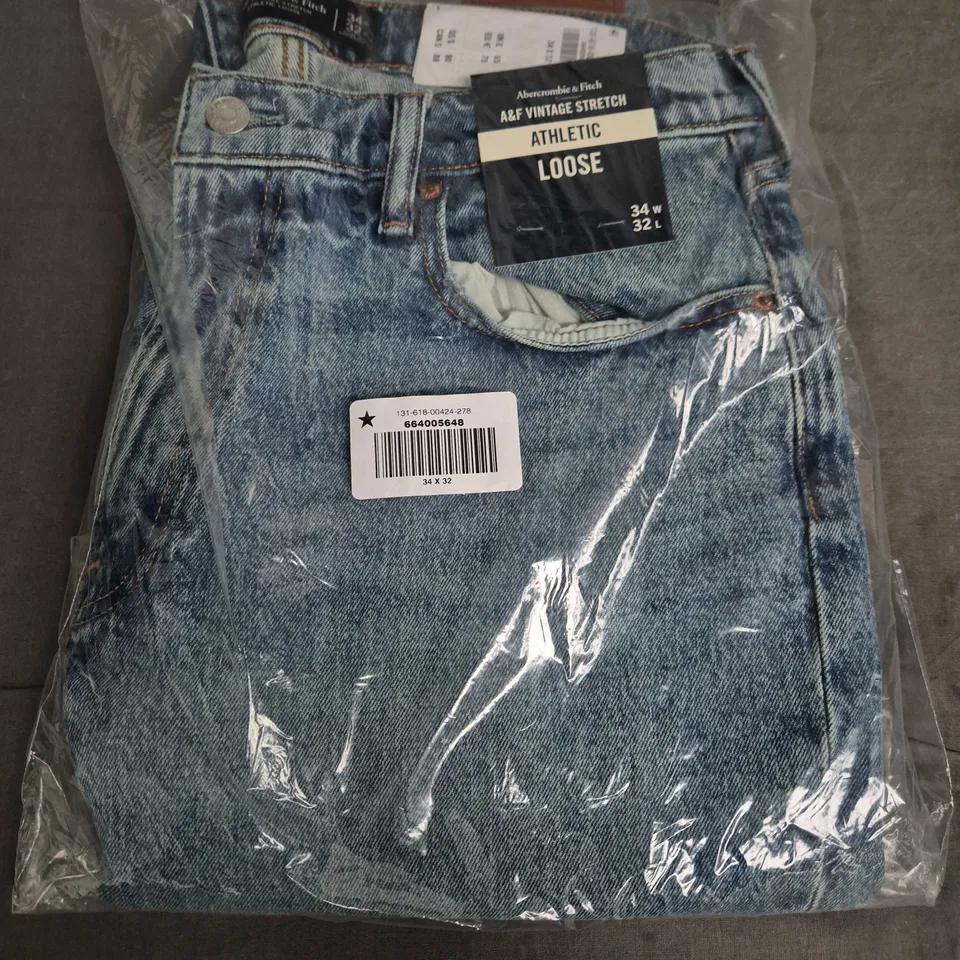 BAGGED ABERCROMBIE & FITCH VINTAGE STRETCH ATHLETIC LOOSE JEANS IN BLUE - 34W/32L