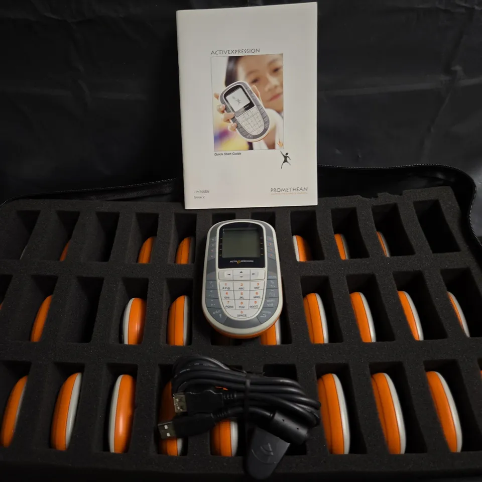 APPROXIMATELY 20 PROMETHEAN ACTIVEXPRESSION HANDHELD CLASSROOM RESPONSE DEVICE WITH USB CHARGER