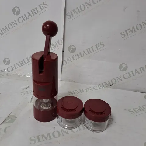 KUHN RIKON RATCHET GRINDER WITH 2 STORAGE POTS IN BRICK RED