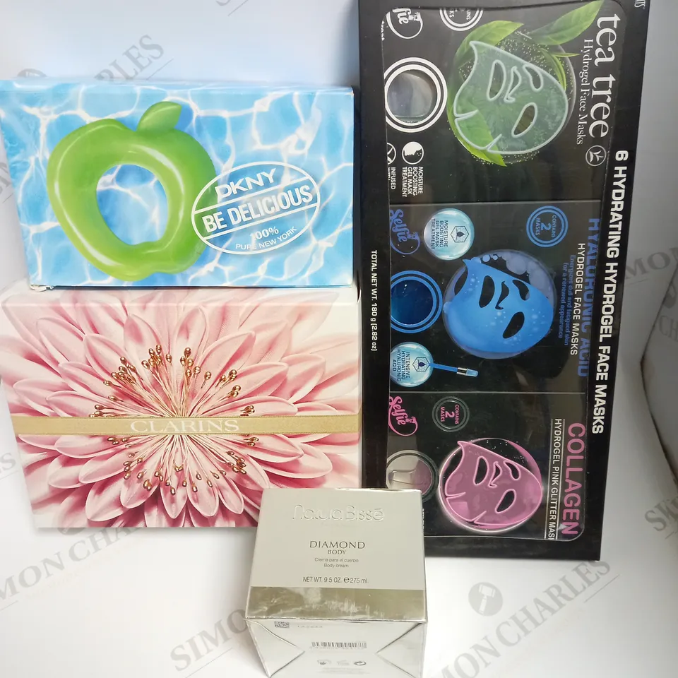 APPROXIMATELY 10 ASSORTED BEAUTY PRODUCTS TO INCLUDE SKIN TREATS HYDROGEL FACE MASKS, NATURA BISSE BODY CREAM, DKNY BE DELICIOUS GIFT SET, CLARINS CONTOURING COLLECTION ETC. 