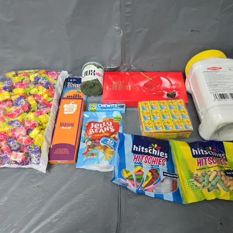 APPROXIMATELY 10 ASSORTED FOOD ITEMS TO INCLUDE JELLY BEANS, HITSHIES, AND MON CHERI ETC. 
